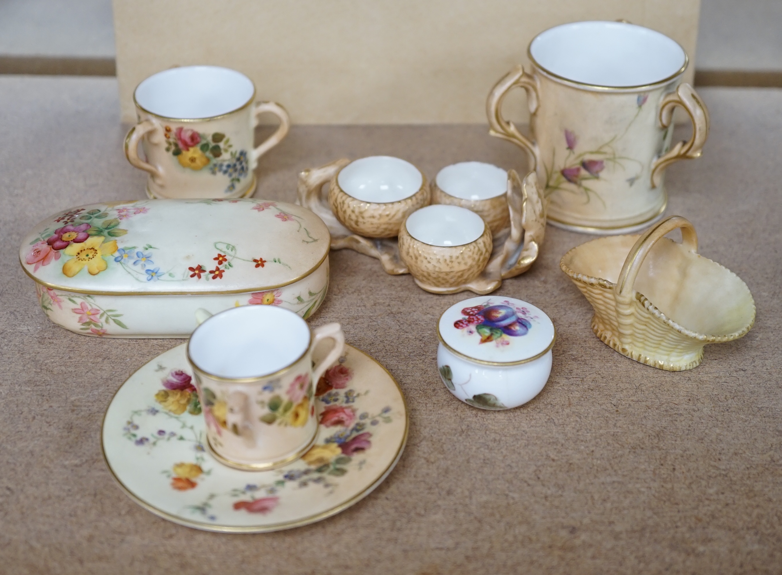 A group of Royal Worcester etc. miniatures including blush ivory tygs and a miniature fruit painted pot and cover, largest 6cm high (8). Condition - mostly fair